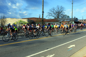 Many bicyclists take to the road in a cycling event.