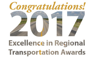 Text set over image of rural road. Text says Congratulations 2017 Excellence in Regional Transportation Awards