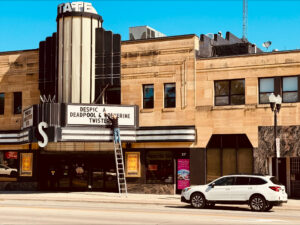 Car driving on rural town road